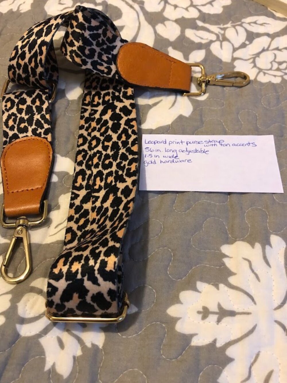 Leopard print purse strap.